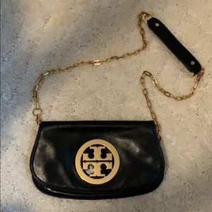 Tory Burch Black and Gold clutch bag